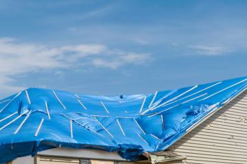 Uptown Houston Roof Tarp Installation by Alpha Roofing & Construction