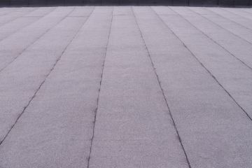 Flat roof by Alpha Roofing & Construction