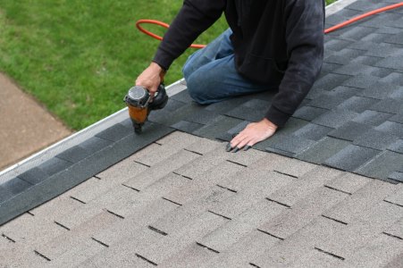 Roof installation by Alpha Roofing & Construction