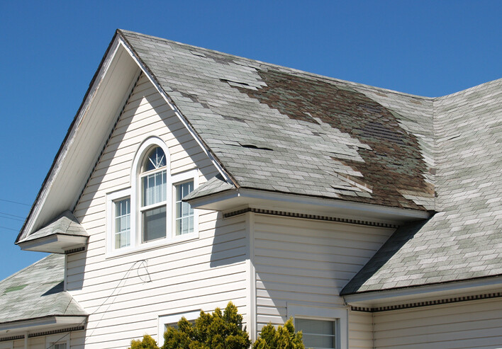 Roof repair after storm damage by Alpha Roofing & Construction